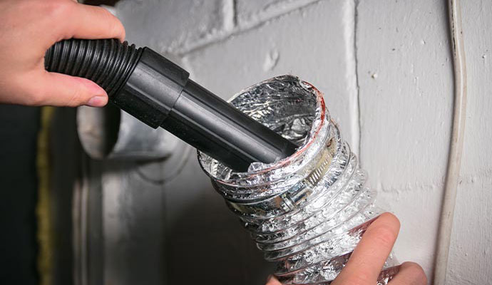 Expert worker cleaning duct pipe Expert worker cleaning duct pipe