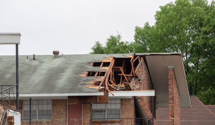 House roof damaged by tornado House roof damaged by tornado