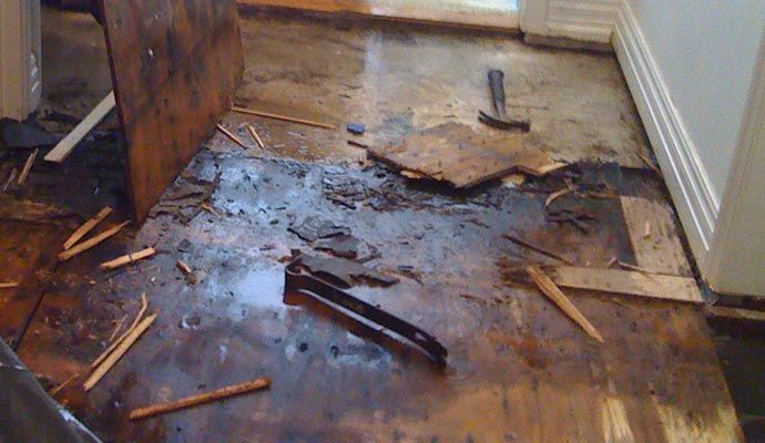 Wood floor severely damaged by water Wood floor severely damaged by water